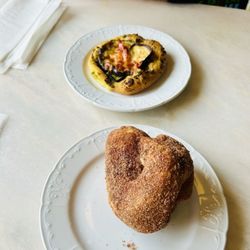 Amaranth Bakery & Cafe - Cinnamon morning bun and brioche with pesto, eggplant, red bell pepper and cheese