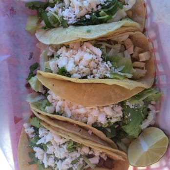 Tacos Oaxaca - One beef, one pork, and two chicken tacos! - Tacos Near Me - Lillington, North Carolina