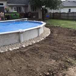 Green Hill Landscaping - River Rock installation around pool