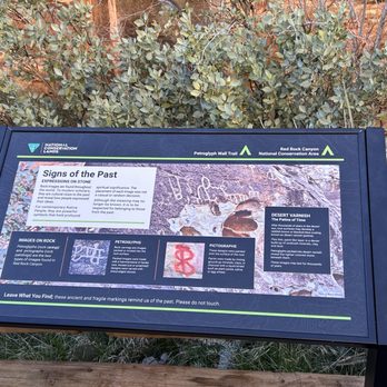 Petroglyph Wall Trail - Sign by the rocks - Hiking Near Me - Las Vegas, Nevada Petroglyph Wall Trail - Sign by the rocks - Hiking Near Me - Las Vegas, Nevada