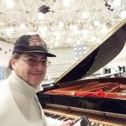 AM Piano Service - Tuning the grand piano, in Cooper Auditorium, at the City of Hope in Duarte for another performance of the LA Opera company.