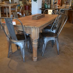 Ciel Loft & Home - Tolix cafe chairs with a reclaimed wood dining table.