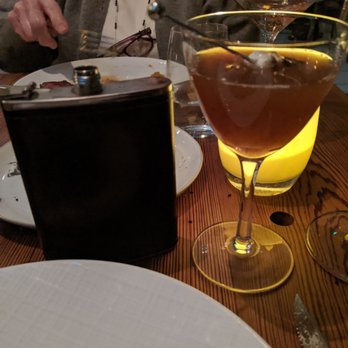 Wild Common - The Caroler's Courage. Marshmallow infused bourbon and served out of a flask for hilarious and adorable theatric effect. - New American Near Me - Charleston, South Carolina Wild Common - The Caroler's Courage. Marshmallow infused bourbon and served out of a flask for hilarious and adorable theatric effect. - New American Near Me - Charleston, South Carolina