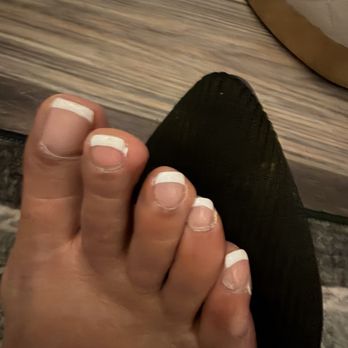 Versaci Nails Spa - u can still see some nail gel polish there on my toe. If you look at both my feet the French is all different thickness in every toe. - Nail Salons Near Me - Eastvale, California