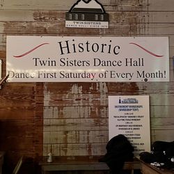 Twin Sisters Dance Hall - By the entrance