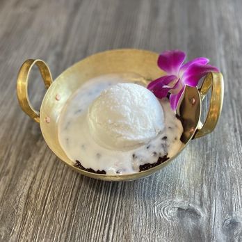 Thai Family Sisters Restaurant - Coconut Ice Cream served with black sweet rice underneath. - Thai Near Me - Upland, California Thai Family Sisters Restaurant - Coconut Ice Cream served with black sweet rice underneath. - Thai Near Me - Upland, California