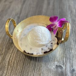 Thai Family Sisters Restaurant - Coconut Ice Cream served with black sweet rice underneath.