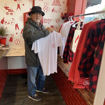 Speak Cheezy - Rudy checking out the merchandise - Pizza Near Me - Long Beach, California Speak Cheezy - Rudy checking out the merchandise - Pizza Near Me - Long Beach, California
