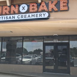 Exterior outside entrance of Churn And Bake Ice Cream - Front of store. - Plano, Texas Exterior outside entrance of Churn And Bake Ice Cream - Front of store. - Plano, Texas