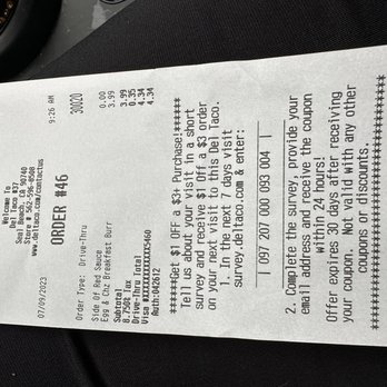 Del Taco - My receipt showing my order and the bacon burrito I was given - Mexican Near Me - Seal Beach, California