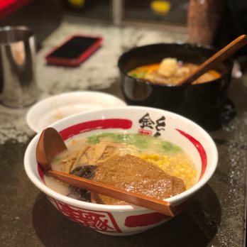 KINTON RAMEN QUEEN & SPADINA - a bowl of ramen with chopsticks - Ramen Near Me - Toronto, Ontario KINTON RAMEN QUEEN & SPADINA - a bowl of ramen with chopsticks - Ramen Near Me - Toronto, Ontario