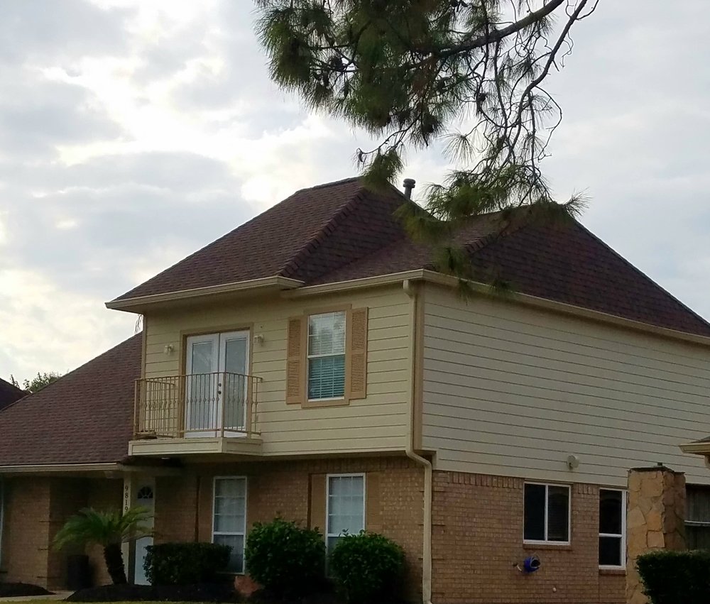 Slide of Houston Roofing Experts