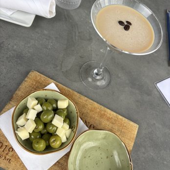 SAVI Cucina + Wine Bar - Olives and The Light Espresso Martini! Perfect little appetizer. - Wine Bars Near Me - Mount Pleasant, South Carolina