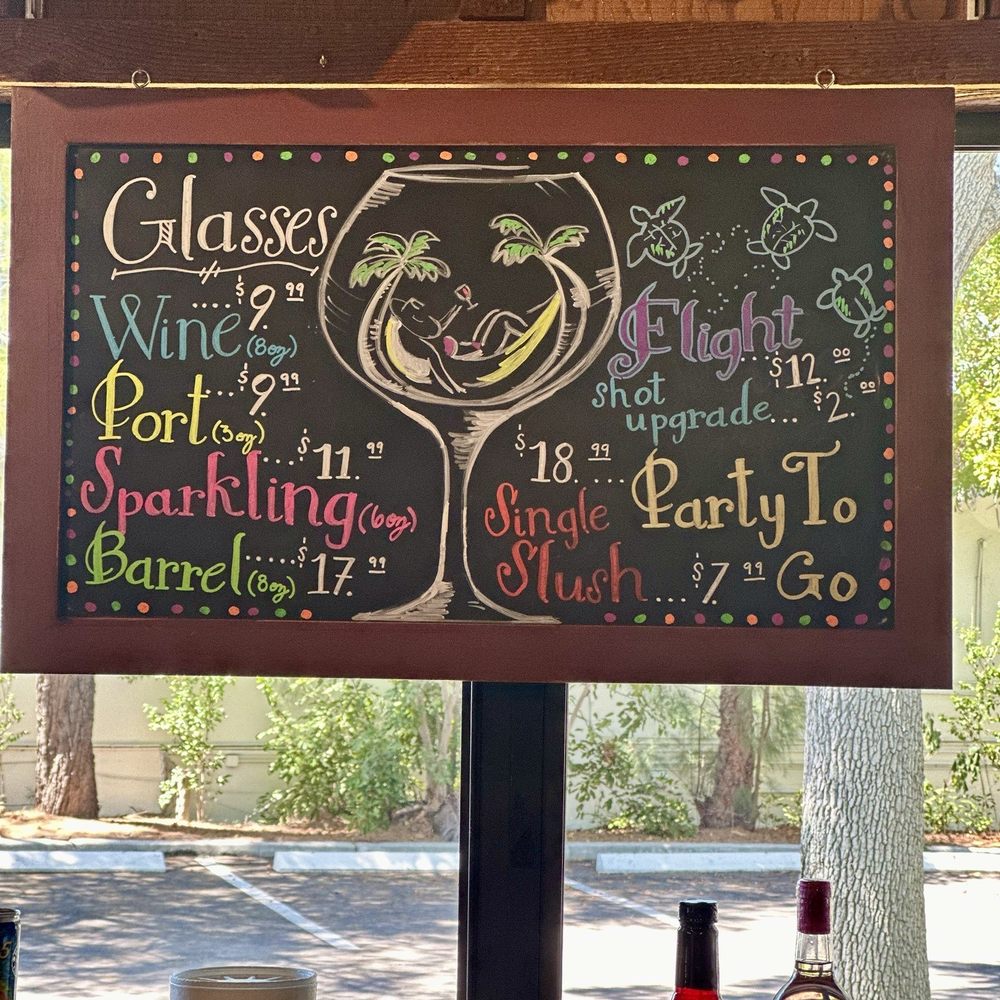 Florida Orange Groves Winery - Flights are a wonderful way to taste before you buy or have a sip of your favor wine - Wine Bars Near Me - South Pasadena, Florida