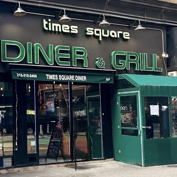 Times Square Diner - Front of the Diner. It currently has scaffolding and a fabric sign out front. - American Near Me - New York, New York Times Square Diner - Front of the Diner. It currently has scaffolding and a fabric sign out front. - American Near Me - New York, New York