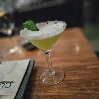 Côba - a cocktail in a martini glass on a table - Sushi Bars Near Me - Outremont, Quebec Côba - a cocktail in a martini glass on a table - Sushi Bars Near Me - Outremont, Quebec