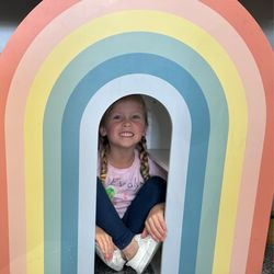 Let's Go Paint! - She'll never miss a photo with a rainbow.
