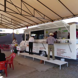 Tacos Emilio's - Food Truck with ample outdoor seating.  Order at the counter, pay before you leave the restaurant.
