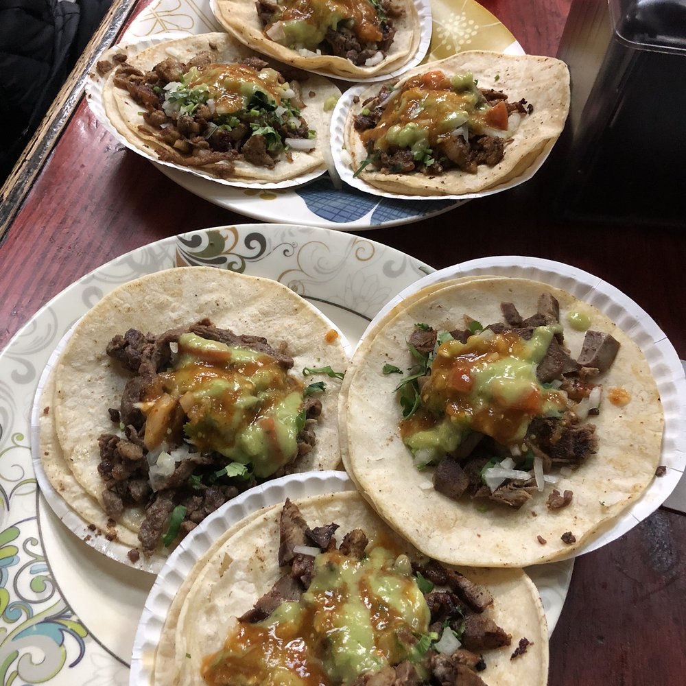 Great Burrito - Bottom plate: grilled steak on top left, carnitas on top right, lengua on bottom - Mexican Near Me - New York, New York Great Burrito - Bottom plate: grilled steak on top left, carnitas on top right, lengua on bottom - Mexican Near Me - New York, New York