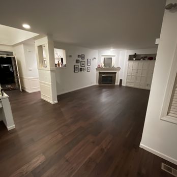 Hardwood Plus - The dark nature of this engineered wood provided tied wonderfully with the white interior finishes. - Flooring Near Me Hardwood Plus - The dark nature of this engineered wood provided tied wonderfully with the white interior finishes. - Flooring Near Me