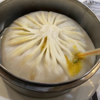 Long Xing Ji Juicy Dumpling - 12. Juicy Pork & Crab Bun (big soup dumpling) - extracting soup with a straw - Chinese Near Me - Baldwin Park, California Long Xing Ji Juicy Dumpling - 12. Juicy Pork & Crab Bun (big soup dumpling) - extracting soup with a straw - Chinese Near Me - Baldwin Park, California