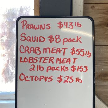 Crabby Bob's Seafood - a price list on a white board - Seafood Near Me - Campbell River, British Columbia Crabby Bob's Seafood - a price list on a white board - Seafood Near Me - Campbell River, British Columbia