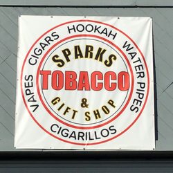 Sparks Tobacco and Gift Shop - Are you trying to find us? Just look for the banner and you'll find us. Sparks Tobacco & Gift Shop has what you need.