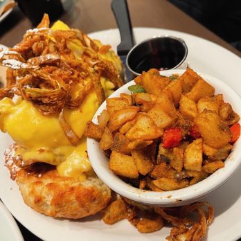 Hash Kitchen - FRIEND WITH BENEDICTS HERB FRIED CHICKEN* two buttermilk biscuits / fried leeks / warm maple reduction / hollandaise - Breakfast & Brunch Near Me - Draper, Utah Hash Kitchen - FRIEND WITH BENEDICTS HERB FRIED CHICKEN* two buttermilk biscuits / fried leeks / warm maple reduction / hollandaise - Breakfast & Brunch Near Me - Draper, Utah