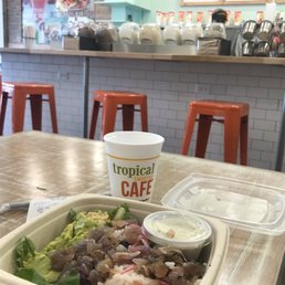 Hummus kale avocado bowl with pickled red onions, cheese, black beans, rice