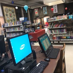 Madison Public Library - Large children's section with computer lab, play area, books, DVDs, etc