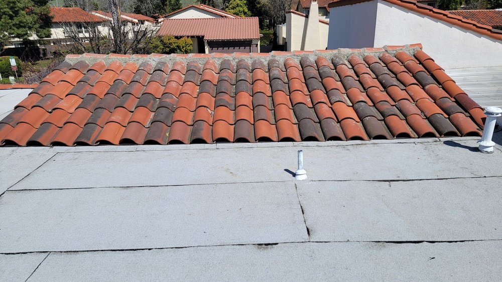 Slide of Husky Roofing