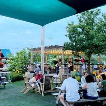 Shady Brook Farm - A smidgen of the outdoor seating which includes picinic tables to eat goods from the store . Photo by sweetminimoments.com - Farmers Market Near Me - Yardley, Pennsylvania