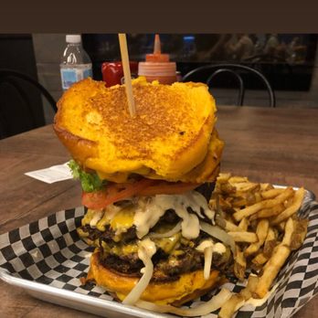 Top Gun Steak & Burger - Not sure what this is called buts it was massive. I took the picture from the table next to us. - Burgers Near Me - Vaughan, Ontario Top Gun Steak & Burger - Not sure what this is called buts it was massive. I took the picture from the table next to us. - Burgers Near Me - Vaughan, Ontario