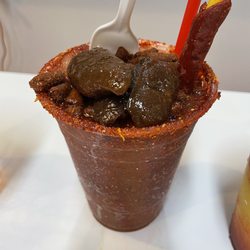 Botanas Locas - Raspado de tamarindo " picosito" - I am not sure if this is the name of it lol ... perfectly spiced :)