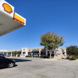 Shell - View of the Local Shoppe, convenience store with USPS inside. Facing Trinity Blvd.