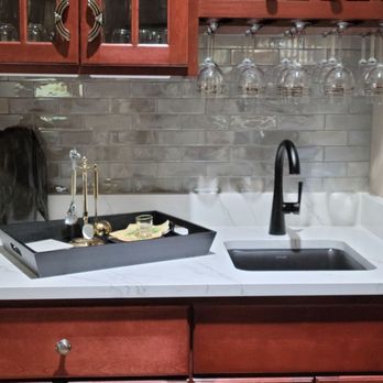 Best Buy Interior Finishes - New bar countertop with black Kohler sink and faucet and custom backsplash - Carpeting Near Me - Naperville, Illinois Best Buy Interior Finishes - New bar countertop with black Kohler sink and faucet and custom backsplash - Carpeting Near Me - Naperville, Illinois