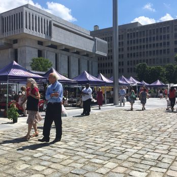 Empire State Farmers' Market - man and woman standing in front of tents - Farmers Market Near Me - Albany, New York Empire State Farmers' Market - man and woman standing in front of tents - Farmers Market Near Me - Albany, New York