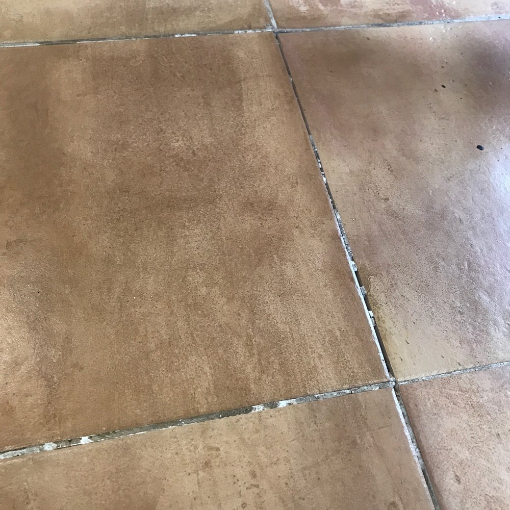 The mortar is coming loose due to movement of tile The mortar is coming loose due to movement of tile