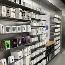 Apple - Brandon - Products on shelves along the walls