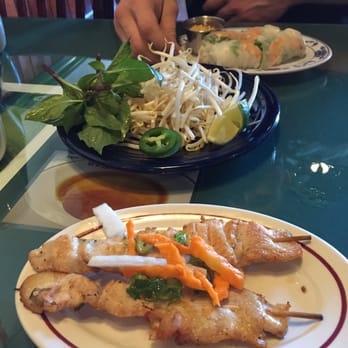 Pho Saigon Restaurant - #3 Grilled Lemon Chicken skewers with some pickled veggies. - Vietnamese Near Me - Springfield, Massachusetts Pho Saigon Restaurant - #3 Grilled Lemon Chicken skewers with some pickled veggies. - Vietnamese Near Me - Springfield, Massachusetts