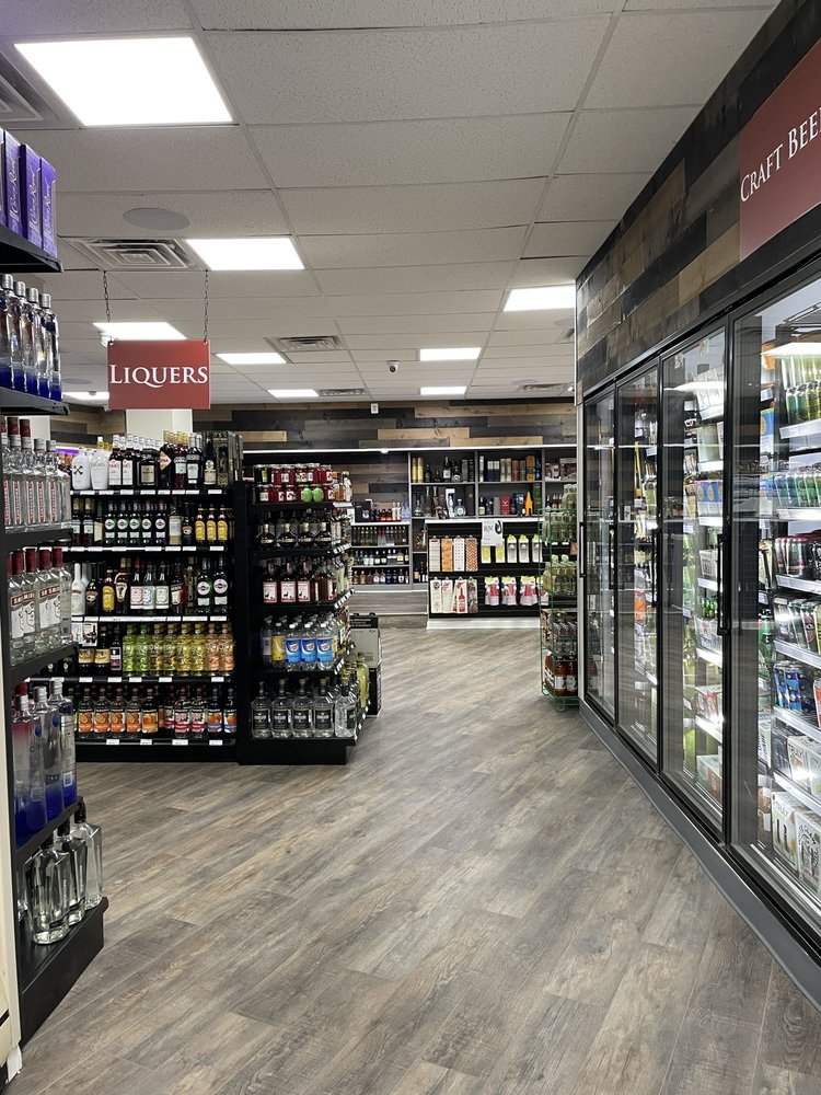 Exotic Wine and Spirits Logo