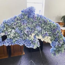 Sweet Karoline's Floral Shop - Custom dolphin standing funeral spray