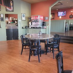 La Villa Roma Restaurant & Pizzeria - Main dining area with service counter on the left.