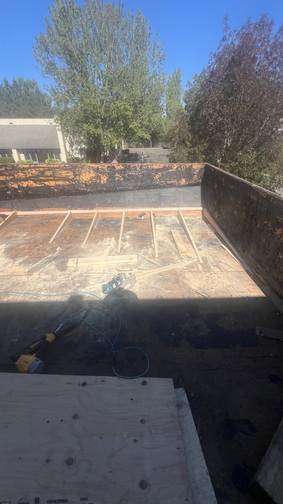 Slide of Empire Roofing