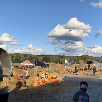 Sidhu Farms - a child in a face mask - Farmers Market Near Me - Puyallup, Washington