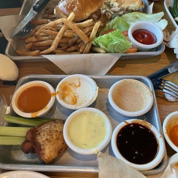 BJ's Restaurant & Brewhouse - Burger and what's left of the chicken thighs. - New American Near Me - Upper Saint Clair, Pennsylvania