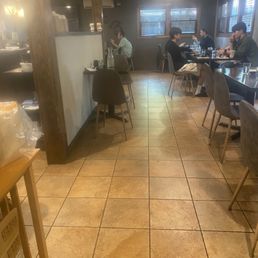 View of dining area from rear. View of dining area from rear.
