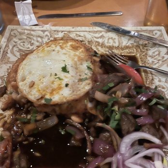Happy Fish - Lomo saltado with tacu tacu and egg - Peruvian Near Me - Tampa, Florida Happy Fish - Lomo saltado with tacu tacu and egg - Peruvian Near Me - Tampa, Florida