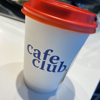 Cafe Club - a cup of coffee on a table - Coffee & Tea Near Me - Vancouver, British Columbia Cafe Club - a cup of coffee on a table - Coffee & Tea Near Me - Vancouver, British Columbia