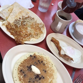 The Diner - Egg Quesadilla with hash browns and the 1x1x1 with bacon, egg over medium and a chocolate chip pancake. we would order it again. - Diners Near Me - Norman, Oklahoma The Diner - Egg Quesadilla with hash browns and the 1x1x1 with bacon, egg over medium and a chocolate chip pancake. we would order it again. - Diners Near Me - Norman, Oklahoma